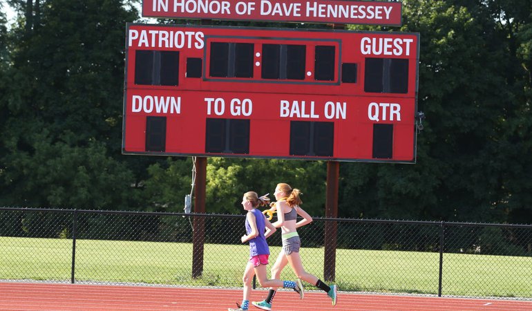 Two girls running