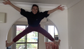 acrobat climbing a door jamb