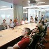 Students meeting around a conference table