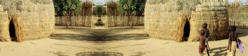 Hut with children in Africa