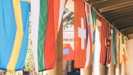 International flags hanging in Avery Courtyard