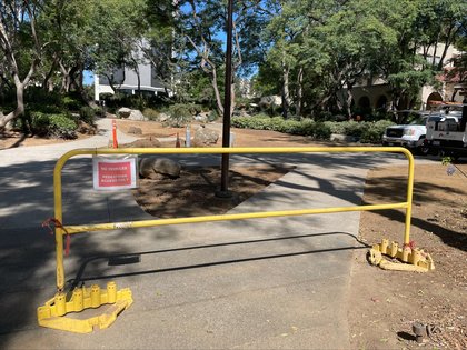 Yellow handrail installed near Throop Memorial Garden
