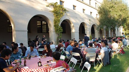 Photograph of tables and people at 2018 Chen Institute BBQ