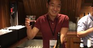 Yisong Yue behind the bar