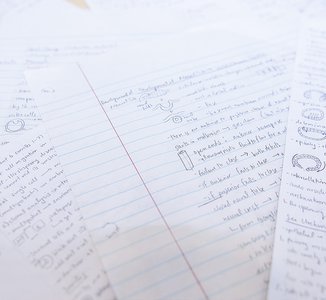 handwritten notes on lined paper