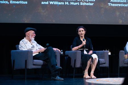 Katerina Chatziioannou speaks as Kip Thorne looks on during a panel discussion on stage