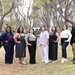 A group of eight CCID staff members standing in semicircle