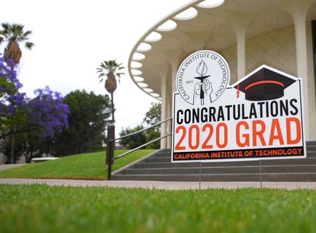 A sign in front of Beckman Auditorium offers congratulations to the Class of 2020.