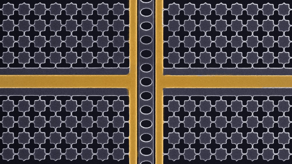 black and white microscope image of a mechanical oscillator with two false-colored vertical golden lines and one horizontal
