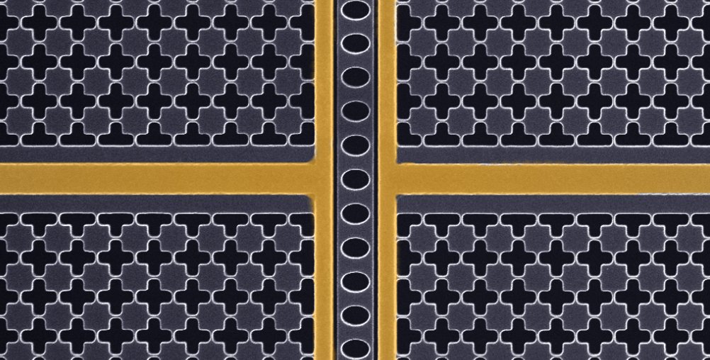 black and white microscope image of a mechanical oscillator with two false-colored vertical golden lines and one horizontal