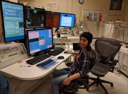 Graduate student Emma Sosa sits works at a computer at Caltech