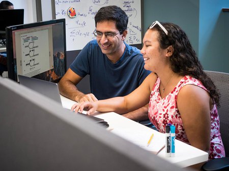 Graduate student Rebekah Loving with Bren Professor of Computational Biology and Computing and Mathematical Sciences Lior Pachter