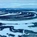 A dark blue river along white ground