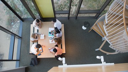 Students sitting at a table.