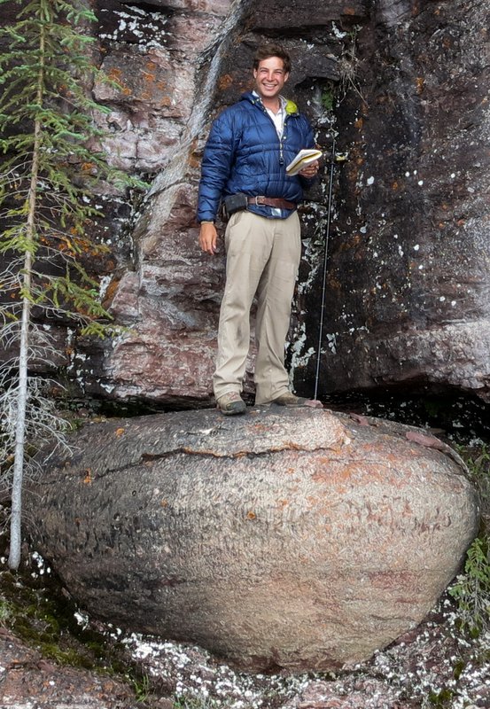 I'm standing on a stromatolite pedestal in the Murky Formation, East Arm of Great Slave Lake, Northwest Territories, Canada