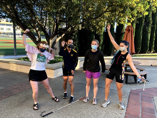 Four students get pumped up for the race outside of the gym.